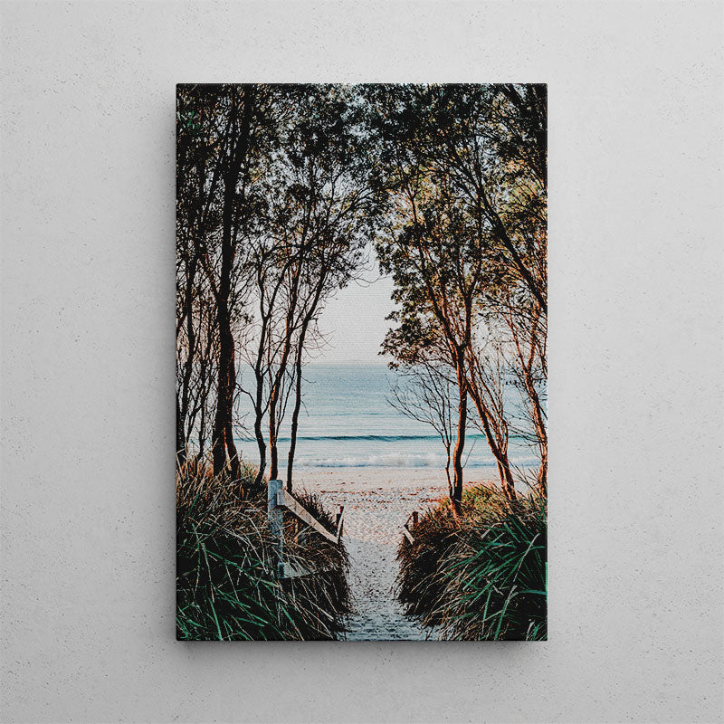 Canvas print of a beach scene with trees and a wooden walkway.