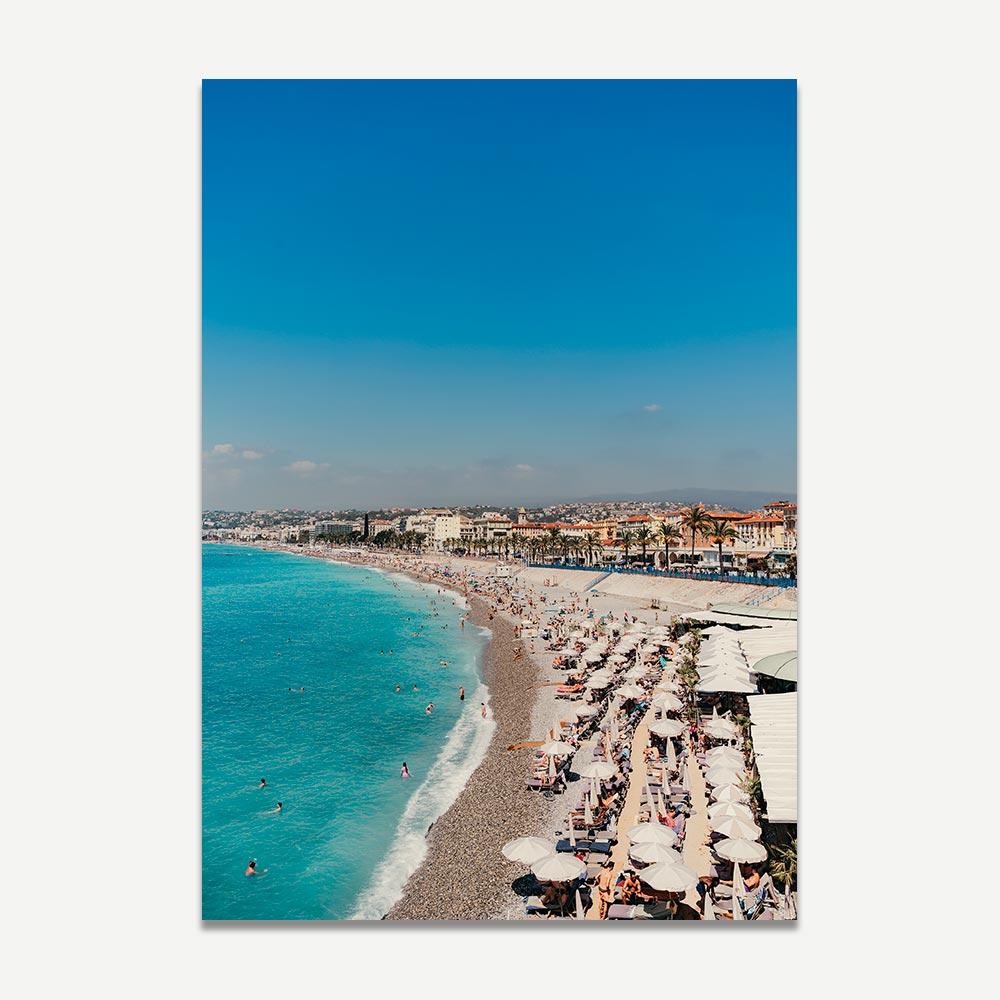 Fine art print of Côte d’Azur Nice with sunlit beach and French Riviera coastline.