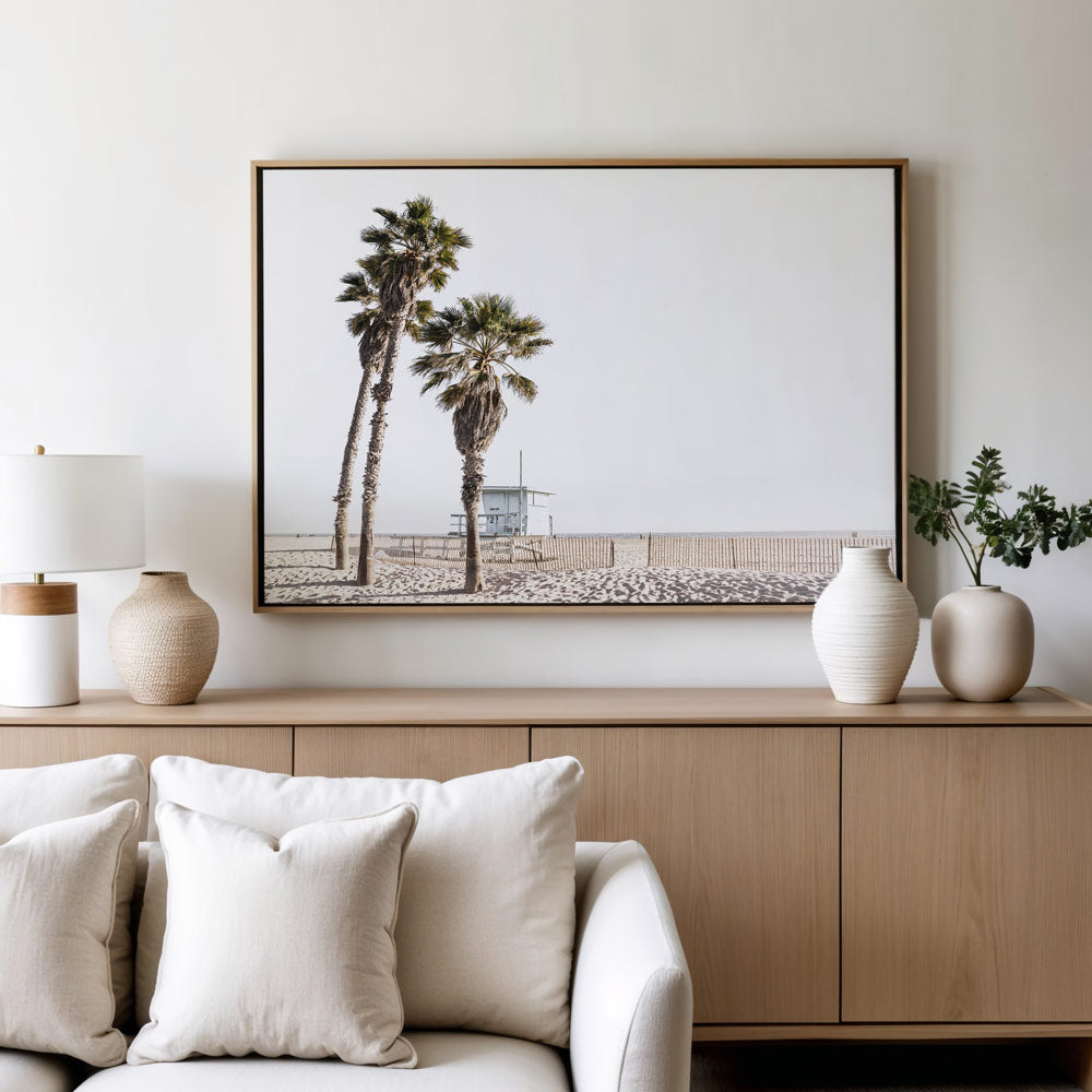 Scenic palm trees at Ocean Park Beach with lifeguard hut in the distance, ideal for modern wall art prints.