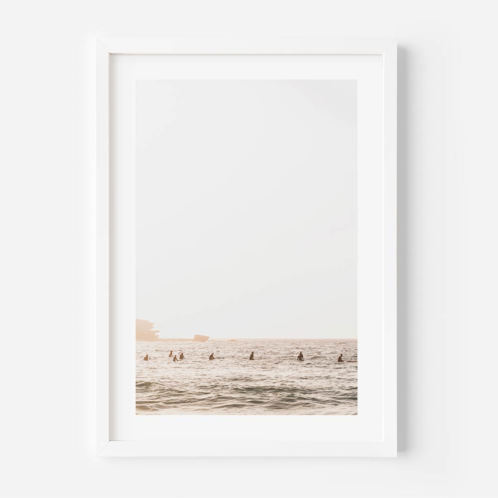 Coastal wall art showcasing Australian surfers walking along the shore with a muted, natural tone palette