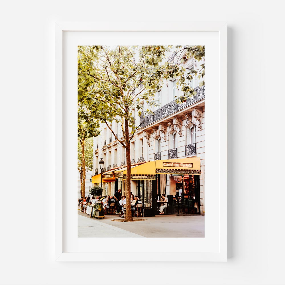 Cozy Paris café with bistro tables and a menu stand, captured in fine art prints for home decor.