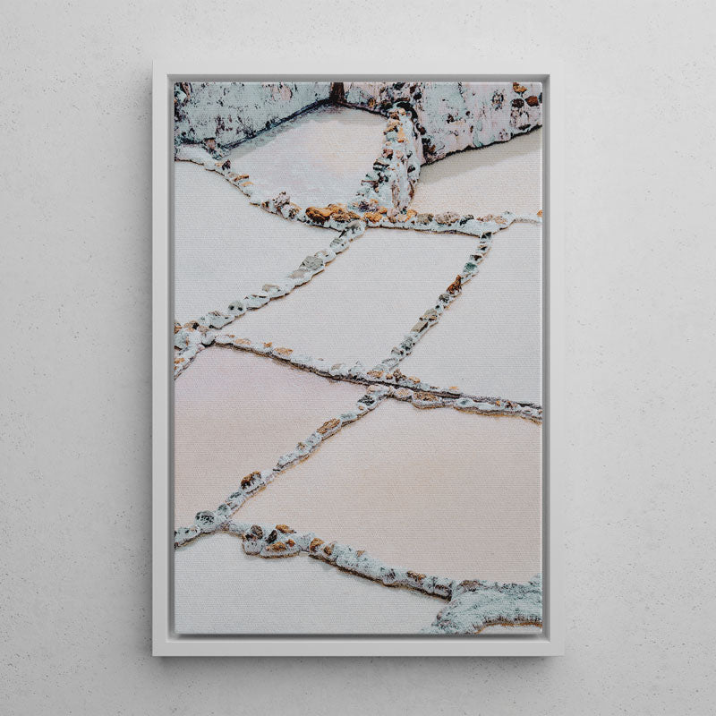 Framed abstract art print on a white wall