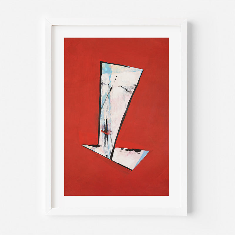 Framed abstract art piece on a red background