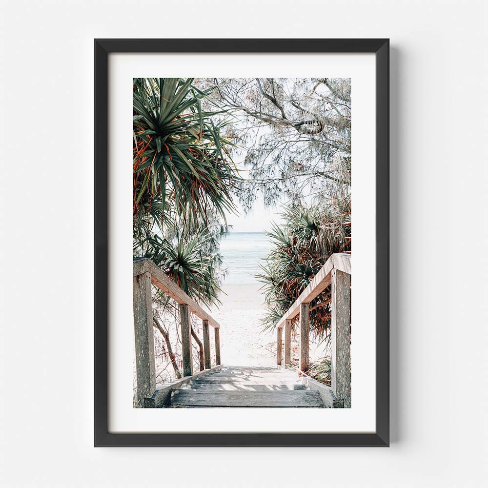 Framed coastal wall art featuring Byron Bay's iconic staircase bathed in morning light