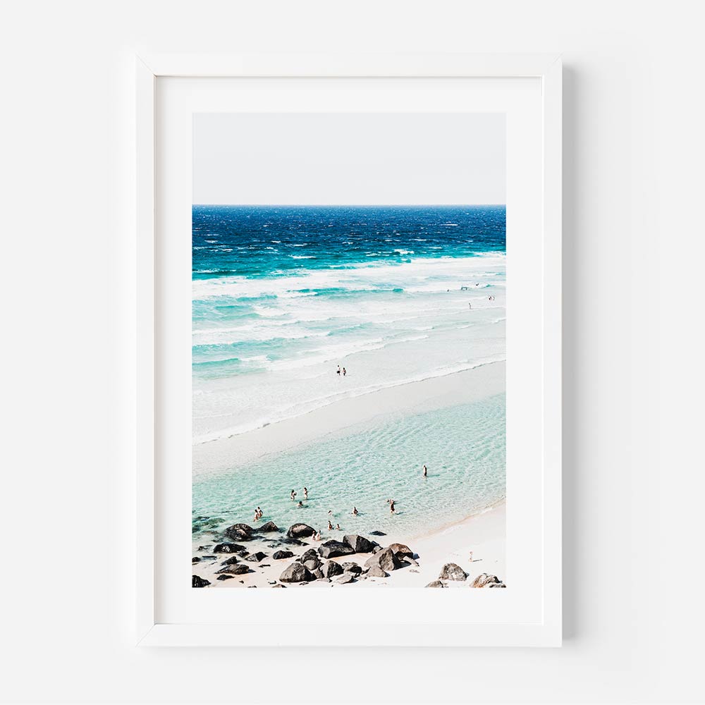 Beach art for wall showing tranquil turquoise sea with beachgoers enjoying sunny day from above view