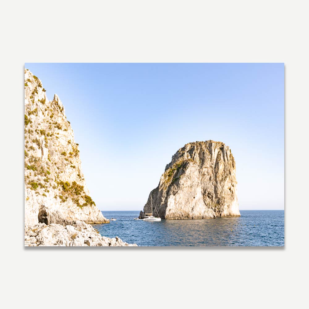 Capri's iconic Faraglioni rocks rising from the Mediterranean Sea, embodying natural beauty and Italian elegance.