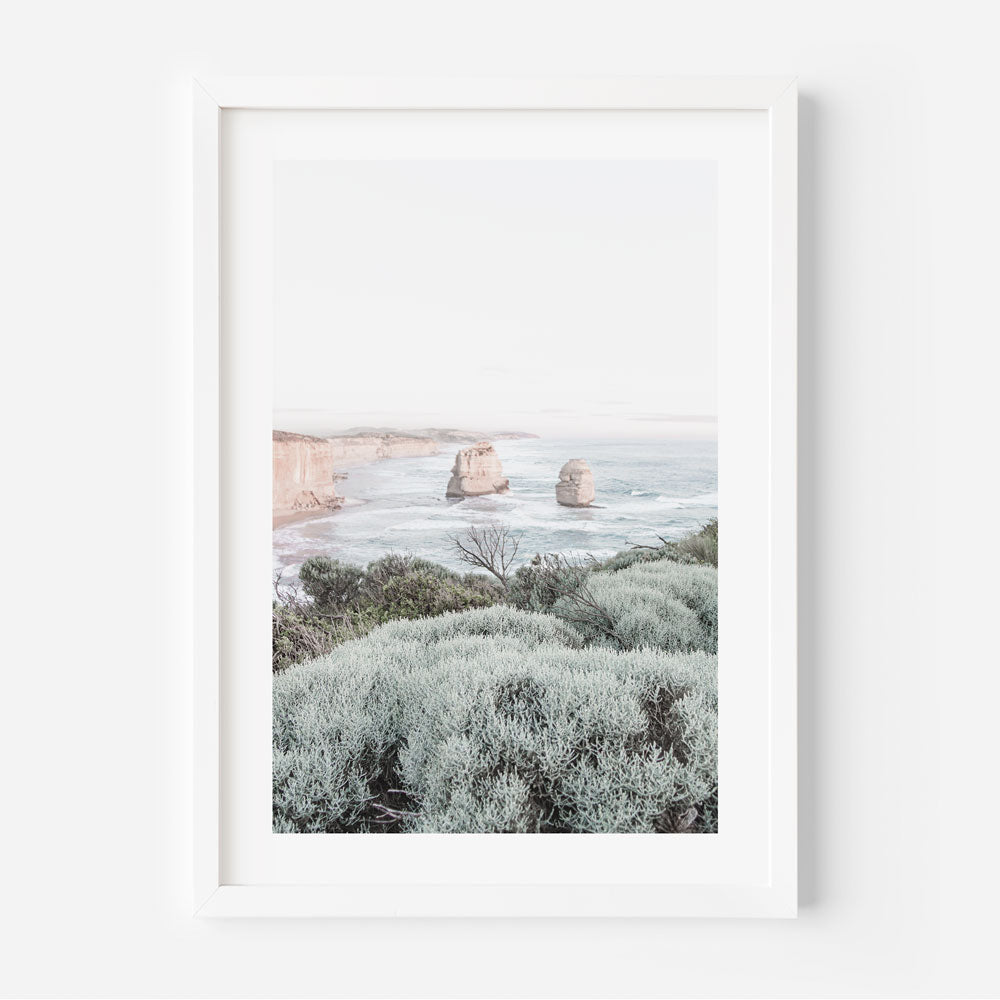 White framed Morning light over Victoria’s Great Ocean Road cliffs captured in soft hues for coastal wall art.