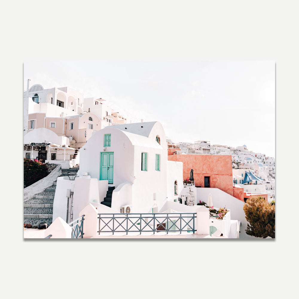 Coastal wall art of Oia, Santorini featuring whitewashed buildings and sunrise – Original photography by Oblong Shop