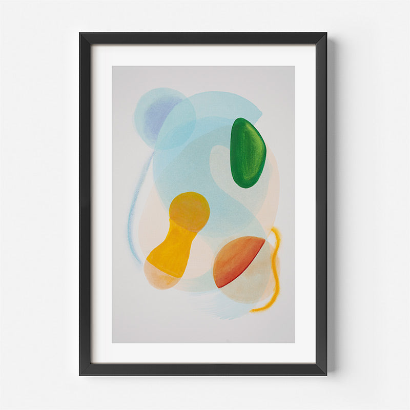 Framed abstract art print with colorful shapes on a light gray background