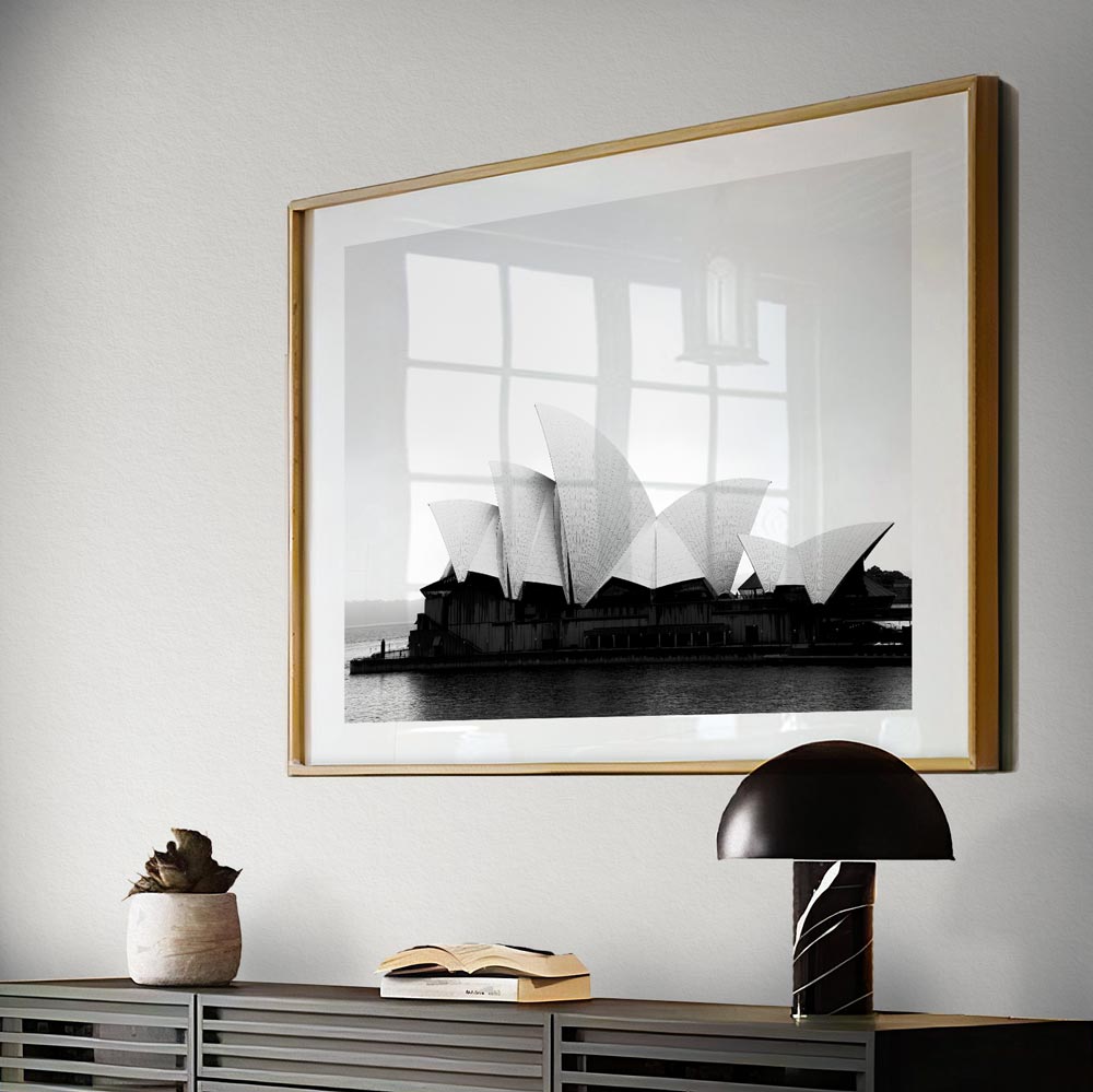 Opera In The Mist wall art featuring Sydney’s Opera House emerging from the mist in a stunning black-and-white photograph.