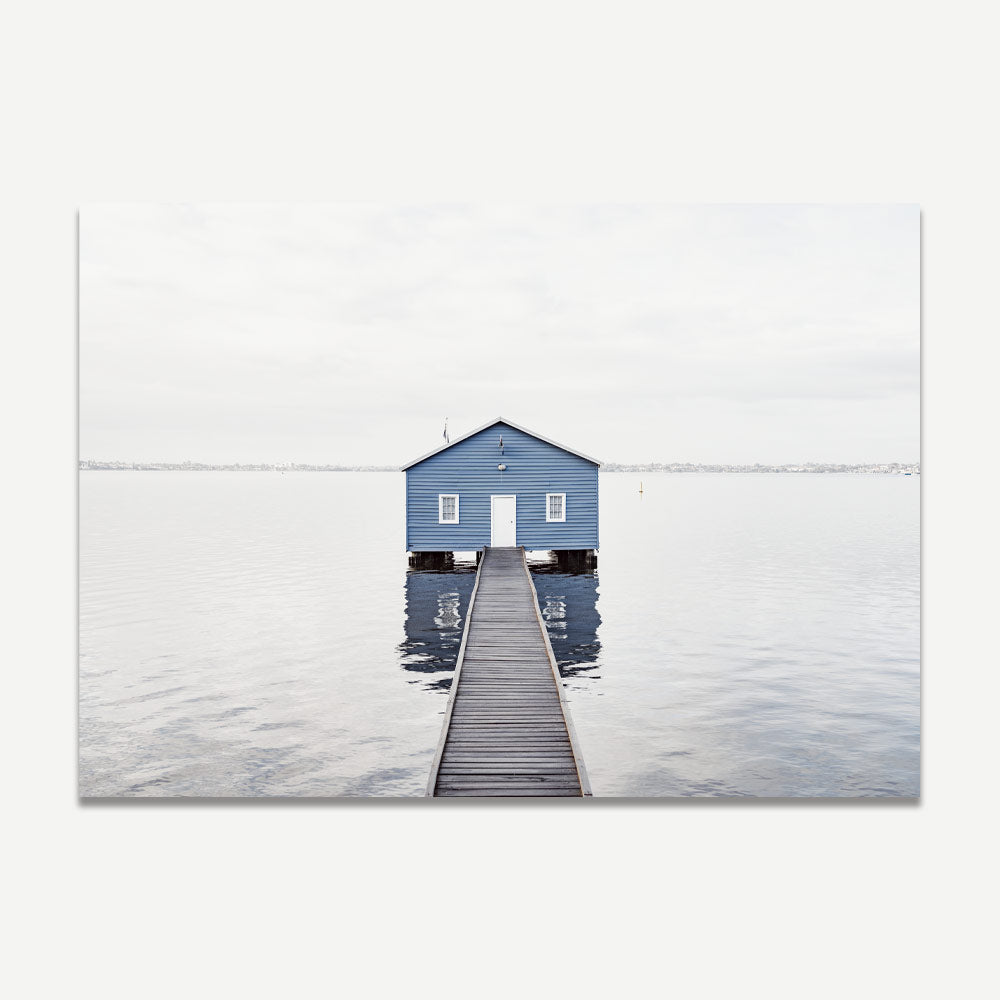 Art print of the Blue Boat House in Perth, Western Australia, with a calm river and a wooden jetty leading up to the house.