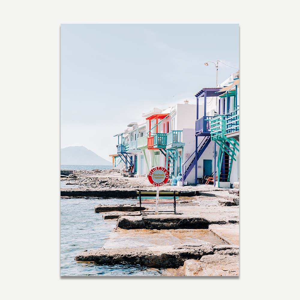 A print of colourful buildings on greek island