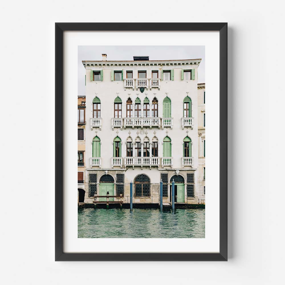 Framed photo art print of a historic Venetian building with green doors overlooking a calm canal – framed architecture wall art from Venice, Italy
