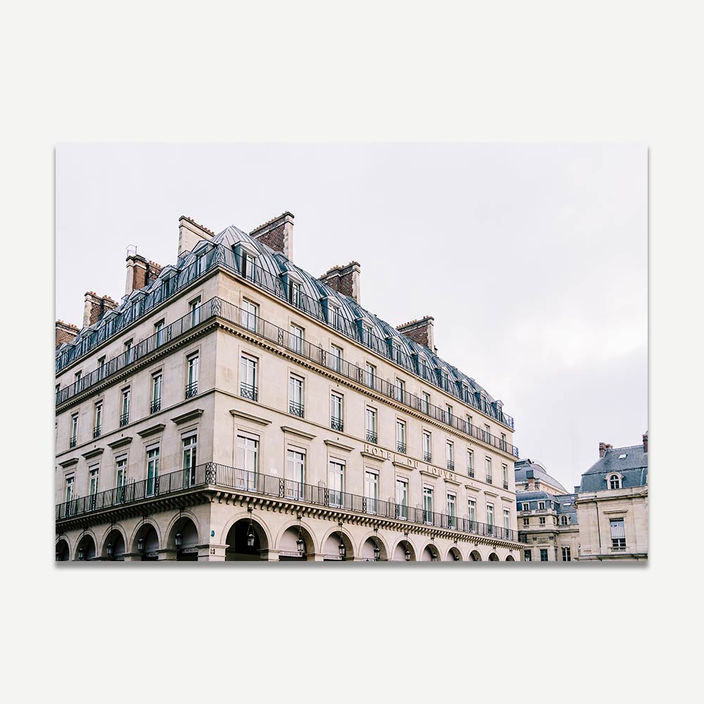 Intricate detailing of Hotel du Louvre captured in original photography for sophisticated wall decor.