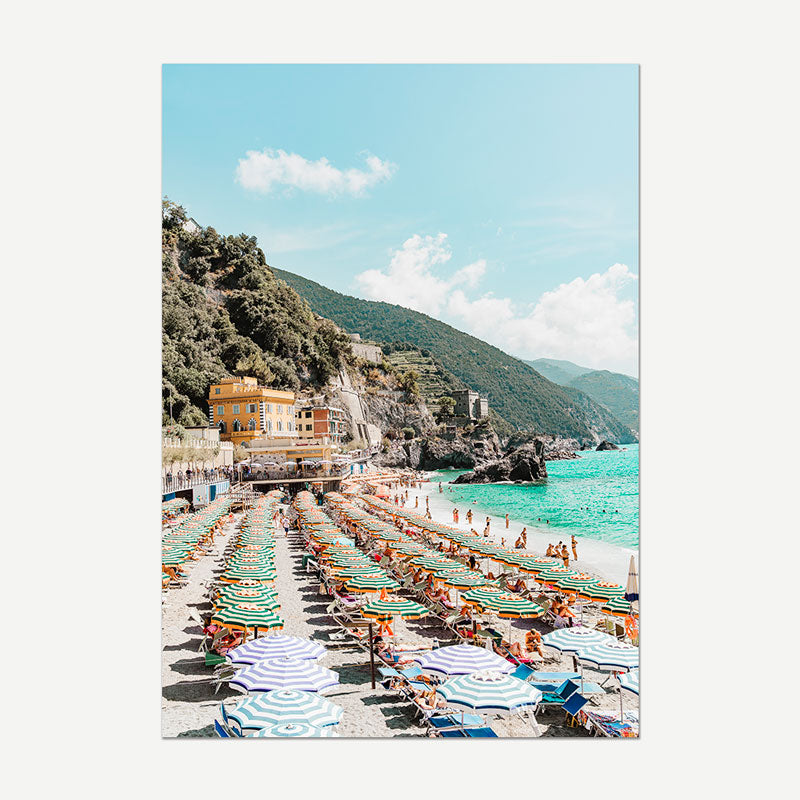 Beach scene with colorful umbrellas and chairs on a white background