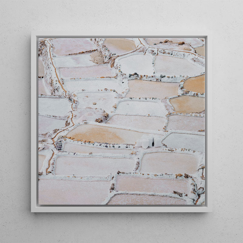 Framed abstract art with earthy tones on a light gray background