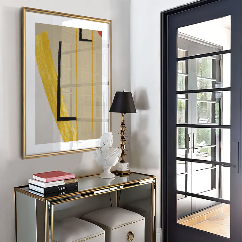 Modern interior with a console table, abstract art, and a lamp.