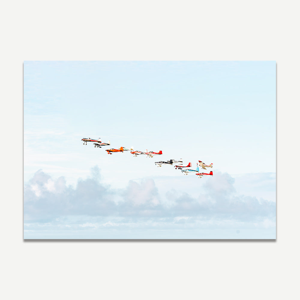 Aerial wall art featuring vintage plane at Pacific Airshow.