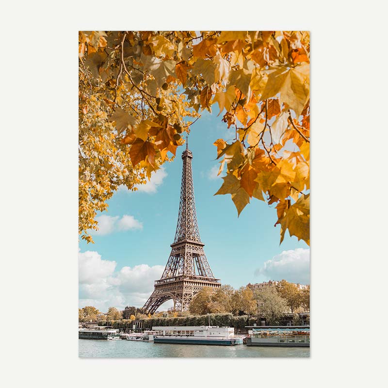 Eiffel Tower with autumn leaves in the foreground