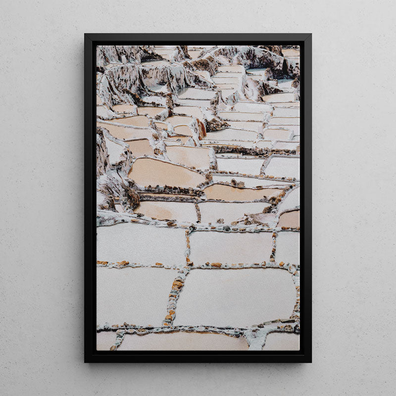 Framed artwork of a textured wall pattern on a light gray background