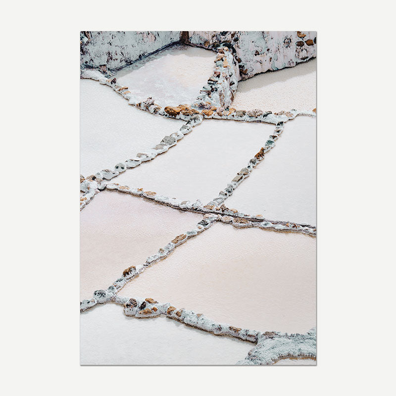 Decorative stone pathway with a white wall in the background