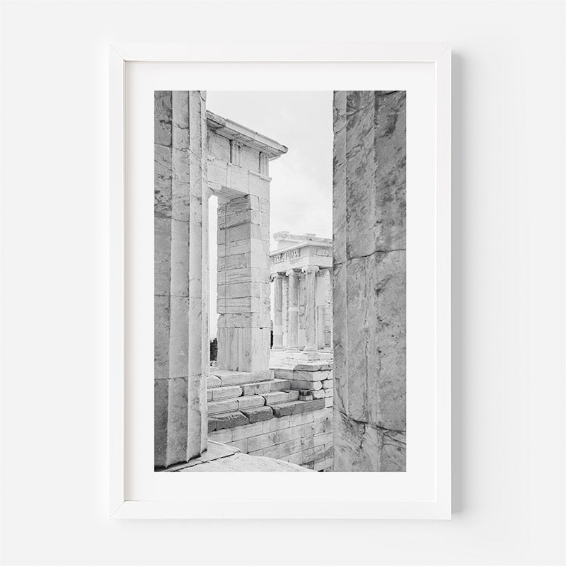 Framed black and white photograph of ancient stone architecture