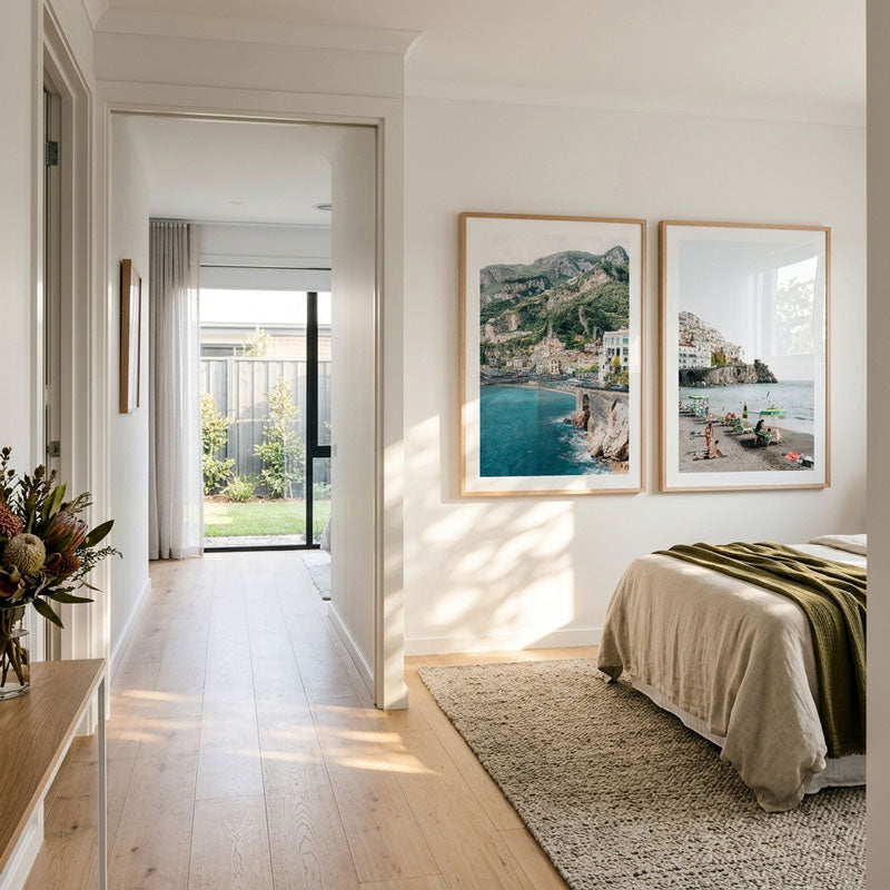 Modern bedroom with framed artwork on the wall