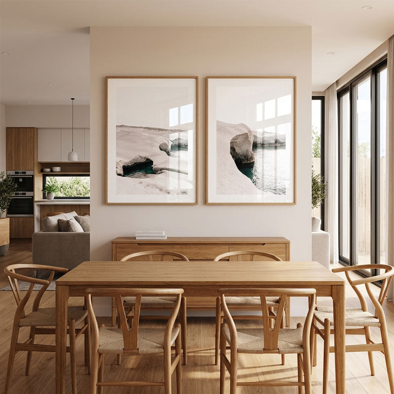 Modern dining room with wooden table and chairs, large windows, and abstract wall art.