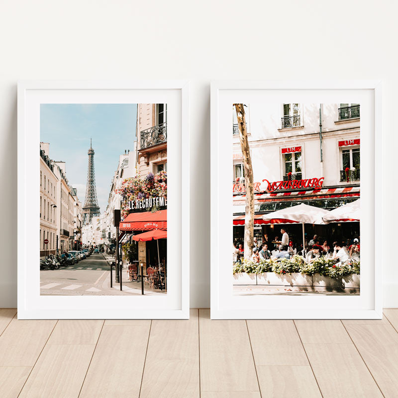 Two framed photographs of Parisian street scenes with the Eiffel Tower and a café.