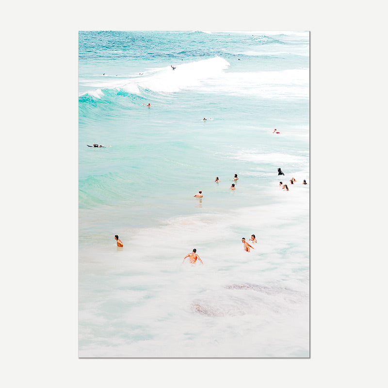 People swimming in a body of water with a white frame