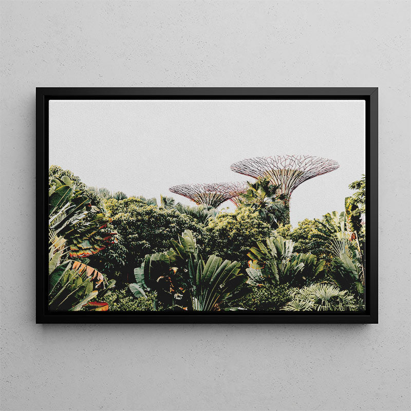 Framed photograph of a tropical landscape with Supertrees in Singapore on a gray wall.