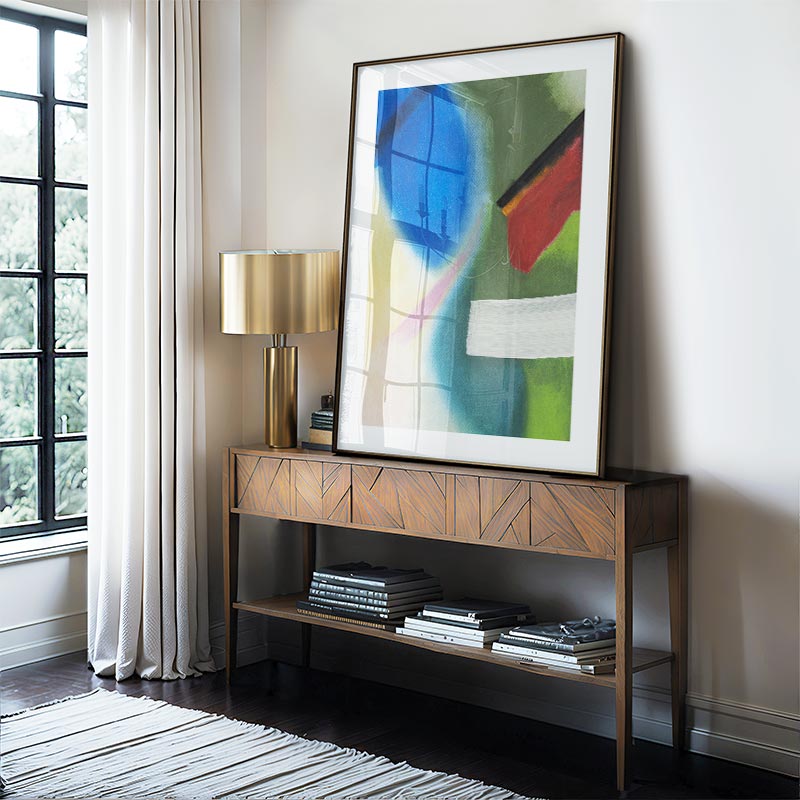 Modern interior with a wooden console table, abstract painting, and lamp.