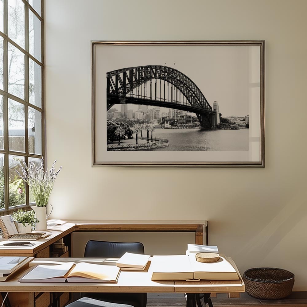 Black-and-white print of Sydney Harbour with the Harbour Bridge and Luna Park, capturing early morning fog and raindrops.