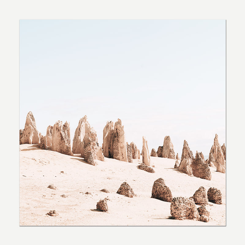 Desert landscape with sandstone formations under a clear sky