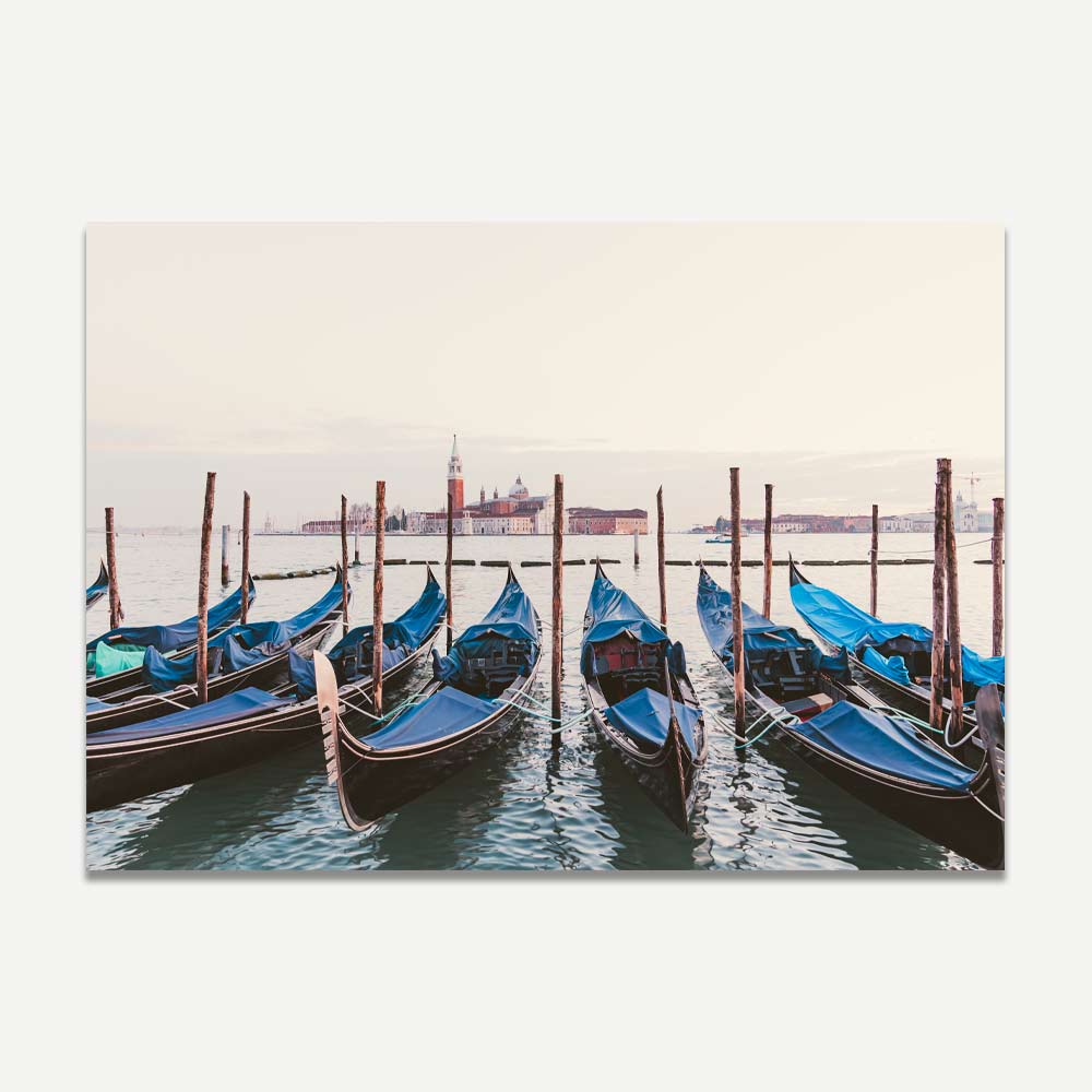 Transform your space into a Venetian paradise with this breathtaking photograph of boats along the poles - a standout piece for any wall artwork collection.