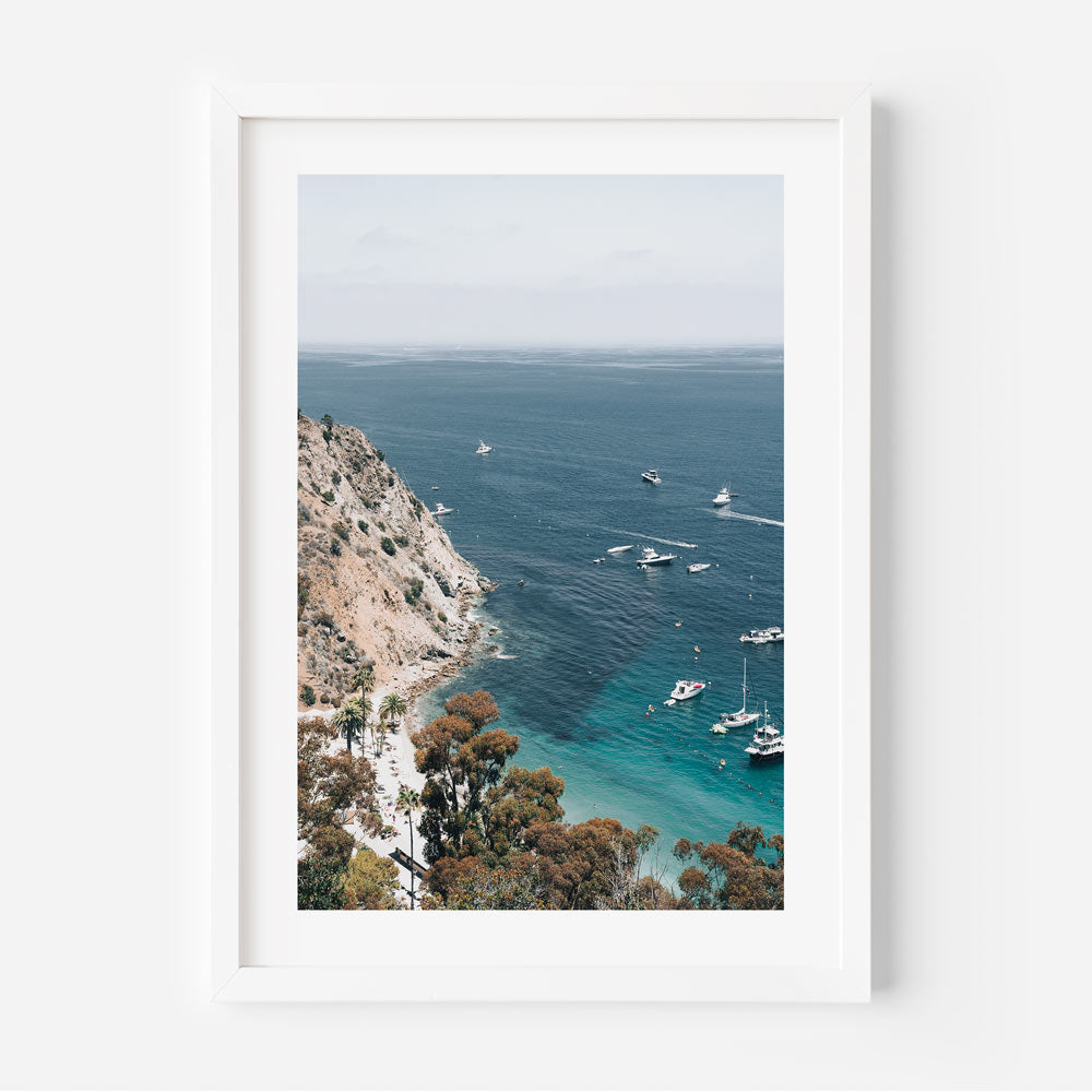 Unique coastal wall art with lively Catalina harbor scene, blue waters, and festive beach atmosphere.