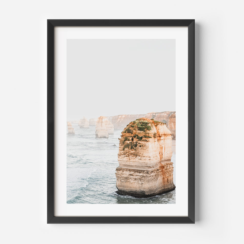 Nature art with soft sunrise light highlighting rugged formations of the 12 Apostles coastline