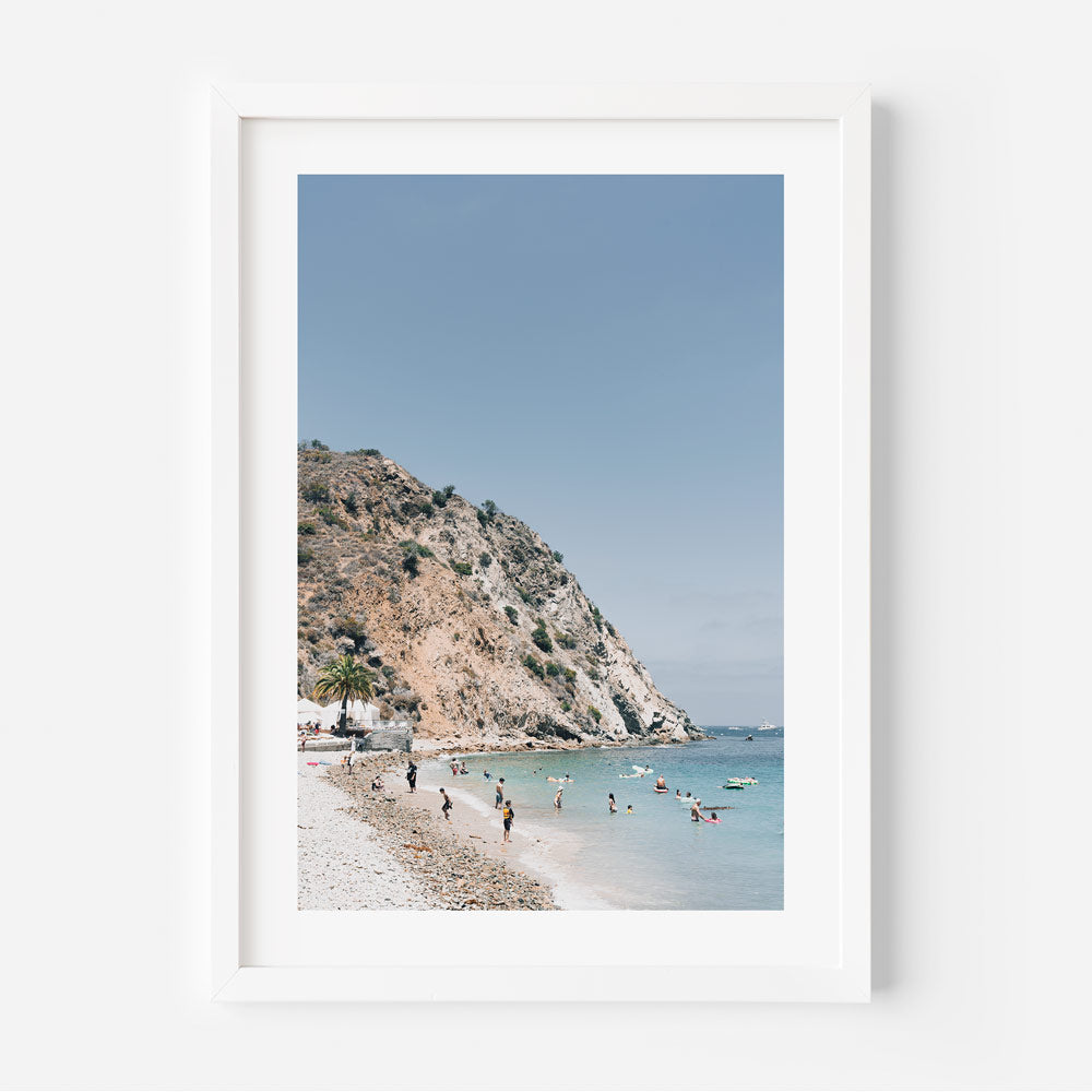 Vibrant wall art from OblongShop of Descanso Beach Club on Catalina Island, capturing beachgoers lounging and playing on the beach.