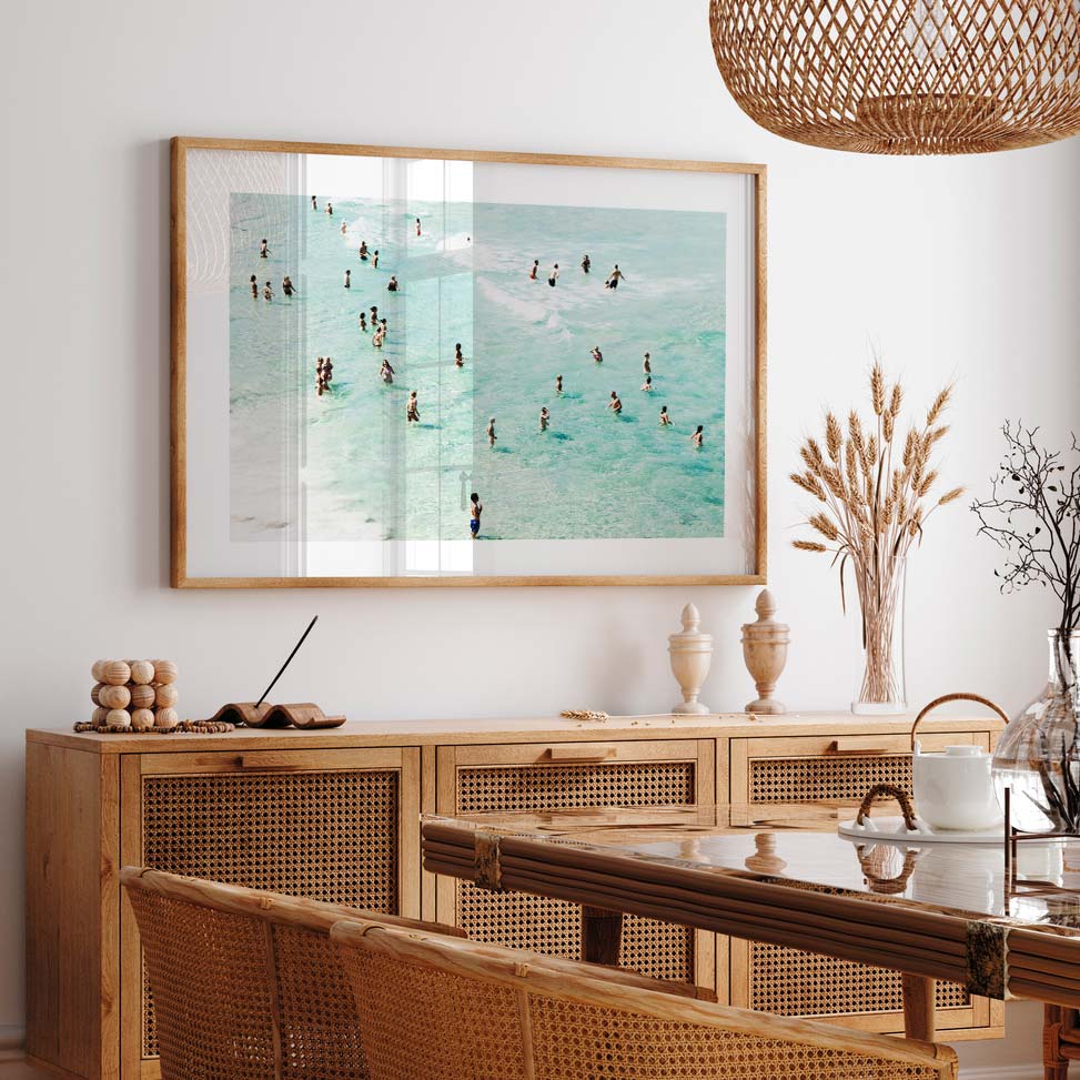 Wall artwork: A golden framed print capturing people swimming in the ocean - Bathers on Bondi Beach