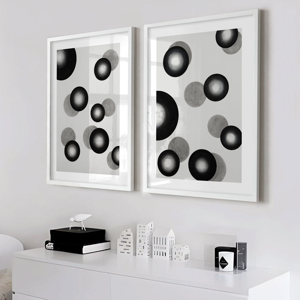 Minimalist black and white abstract wall art with overlapping circular brush patterns in grayscale tones.