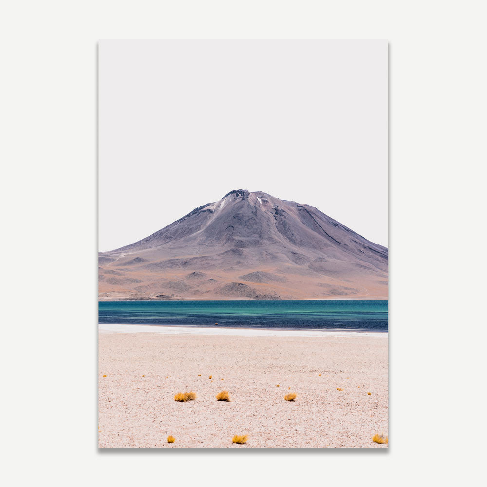 A poster featuring a landscape photograph with a prominent volcano, clear blue sky, and a purple-hued sky. The foreground shows a dry, arid landscape with scattered plants.
