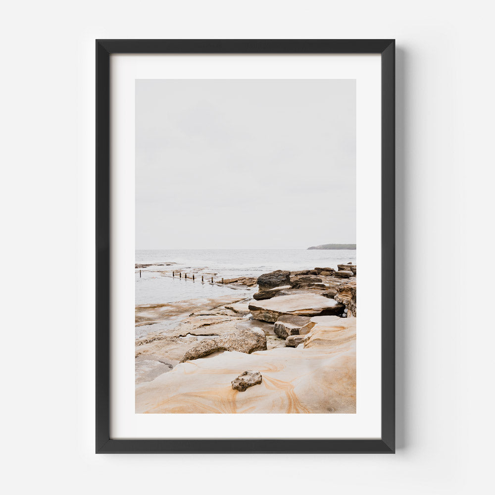 Enhance your living space with a stunning wall artwork from Oblongshop, showcasing the tranquil ocean and rocks at Mahon Pool, Maroubra.