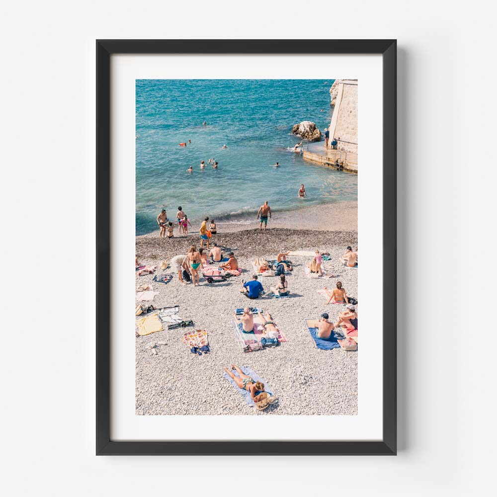 Art gallery: Capture the essence of seaside leisure with "A La Plage," featuring beach enthusiasts enjoying the shores of Nice, France.