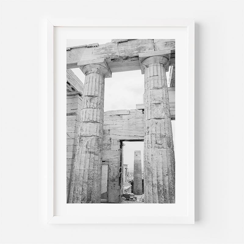 Framed black and white photograph of ancient temple ruins with columns.