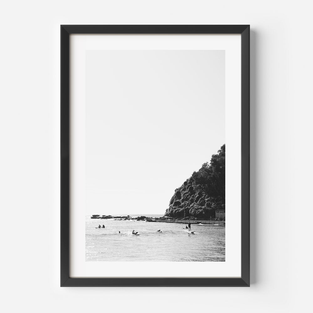 Explore the beauty of Palm Beach with this stunning black and white photograph of surfers - Great for wall artwork.