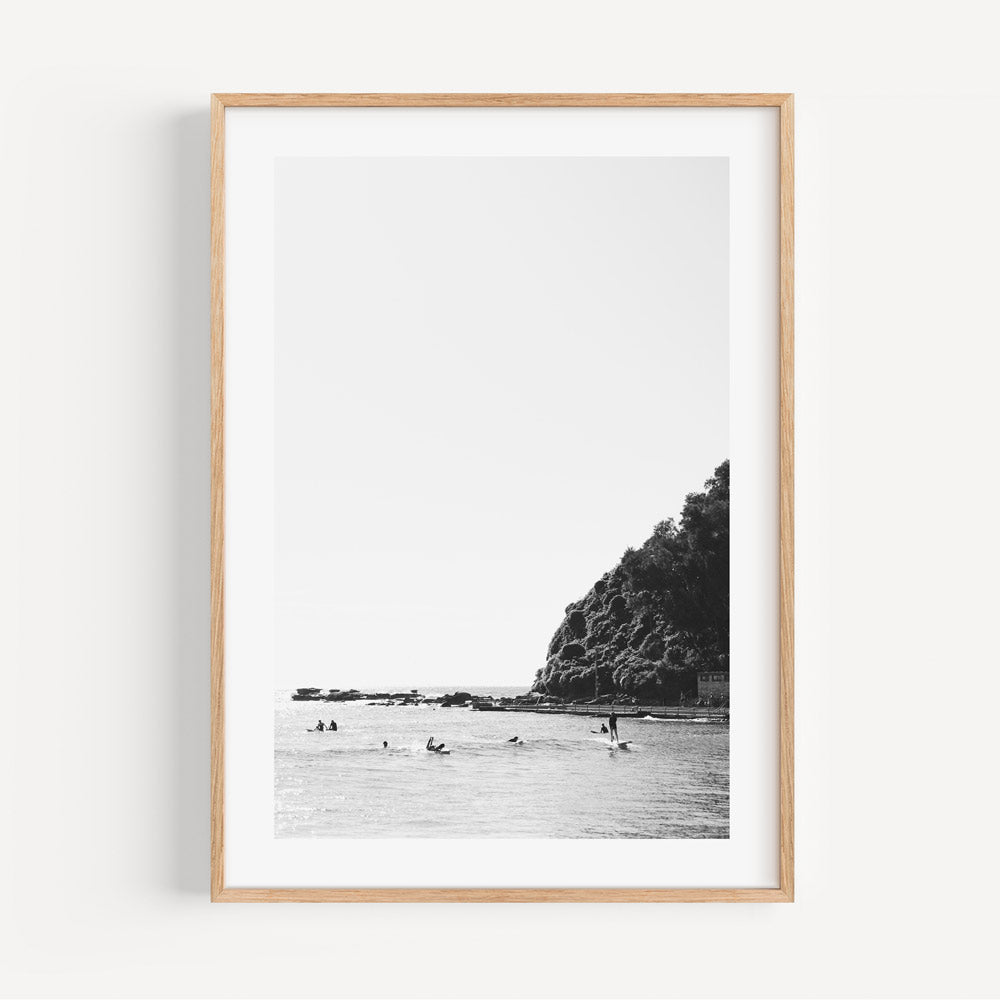 Iconic black and white silhouette of surfers at Palm Beach - Enhance your space with modern canvas prints."