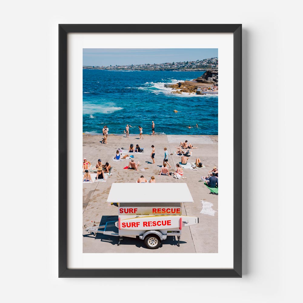 Wall art showcasing coastal relaxation at Clovelly, Sydney: Bay Patrol vehicle overseeing beachgoers.