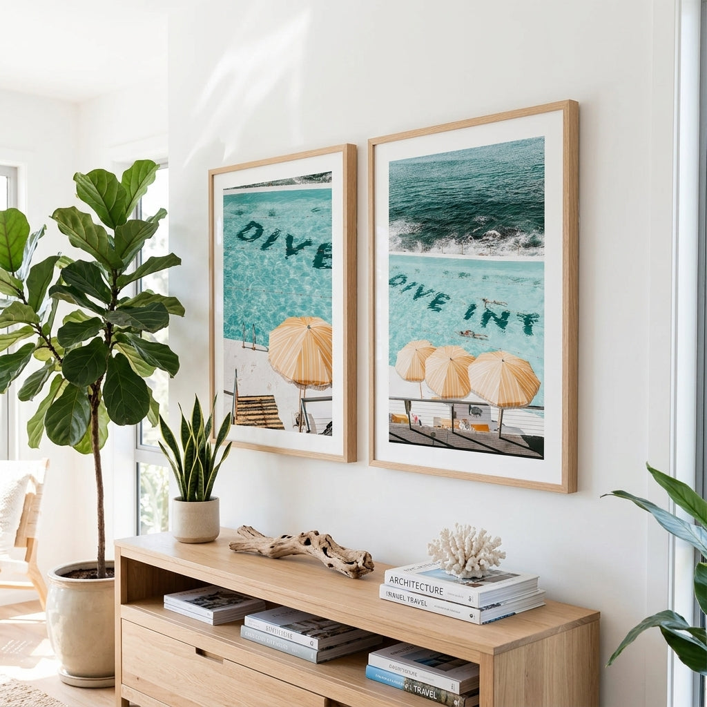 Living room with a wooden console table, decorative items, and two framed beach photos on the wall.
