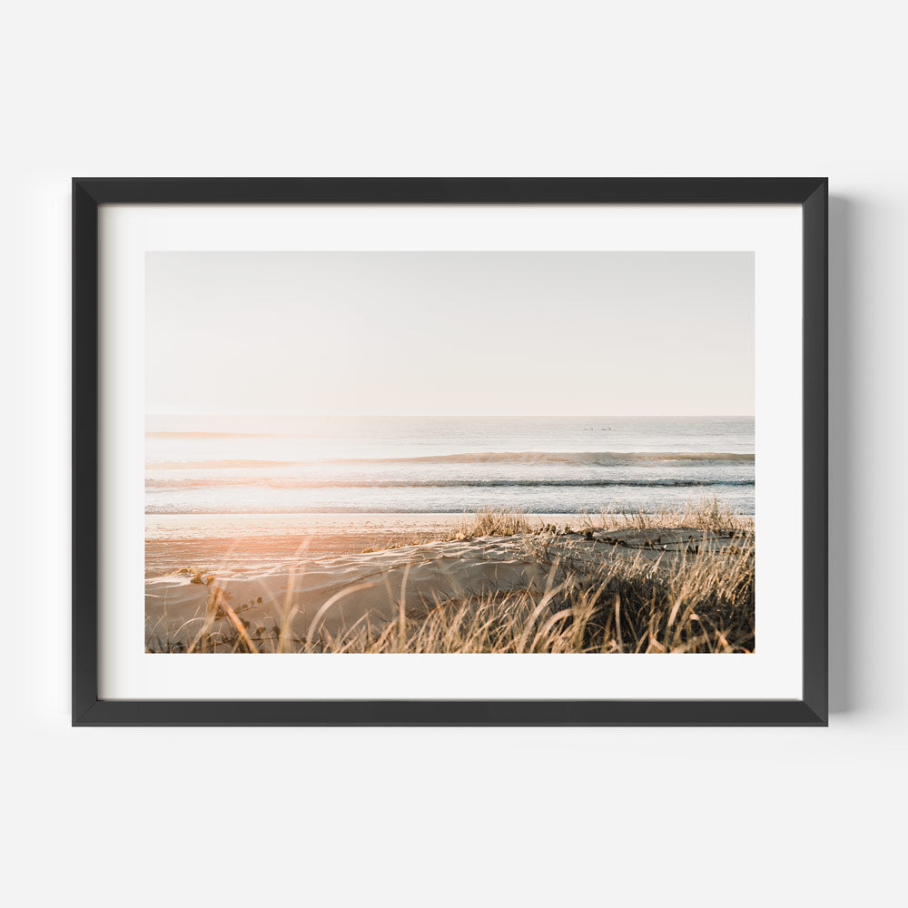 Golden hues and peaceful waves at Main Beach, Gold Coast, in a framed art print.
