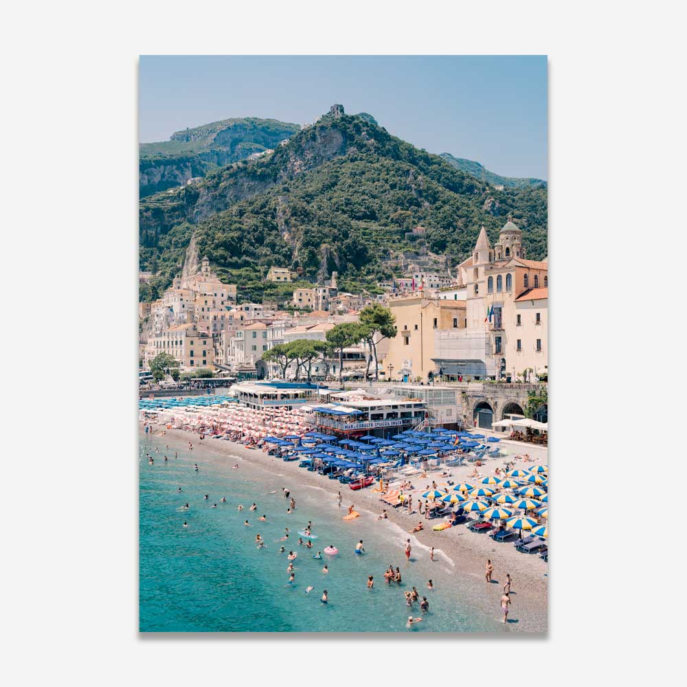 Amalfi Marina Grande summer scene with beach umbrellas and sunbathers – vibrant coastal wall art capturing the essence of Italian seaside living and summer charm.








